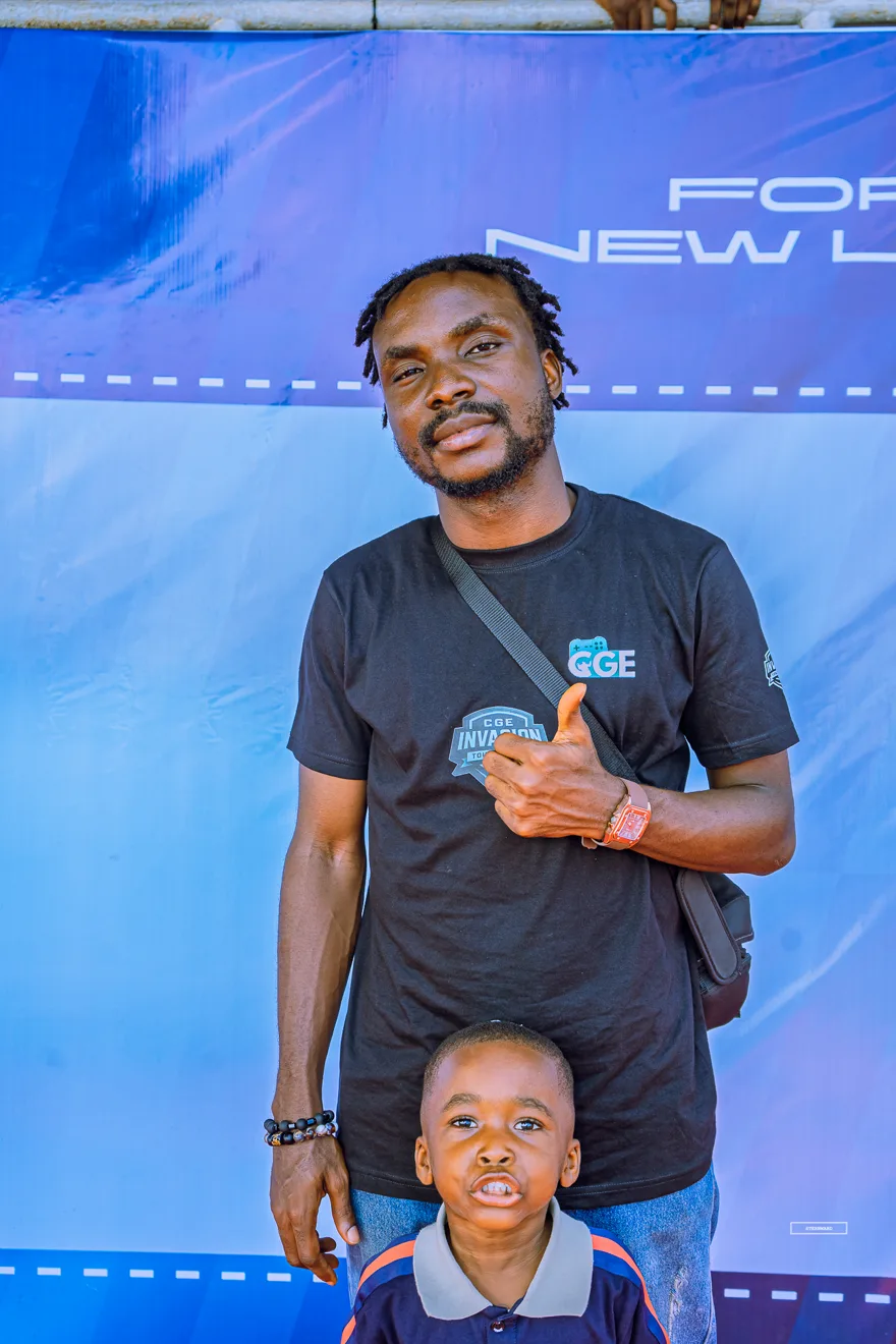 Attendees posing in front of the one million naira prize pool banner